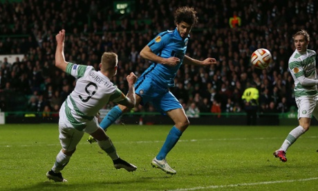 Celtic's John Guidetti lashes home his late, late equaliser.