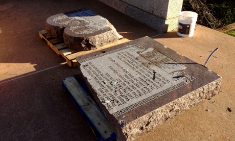 The damaged remains of a Ten Commandments monument are gathered on the Oklahoma State Capitol grounds.
