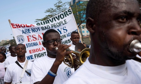 The blood of Ebola survivors like these, marching in a Valentine's Day parade in Monrovia, could help others fight the disease.