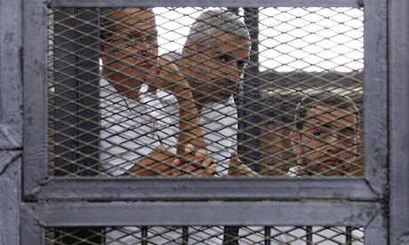 From left: Peter Greste, Mohammed Fahmy and Baher Mohamed during their trial in June 2014. Fahmy, as a Canadian, is also expected to be deported but Mohamed must hope for a presidential pardon or retrial.