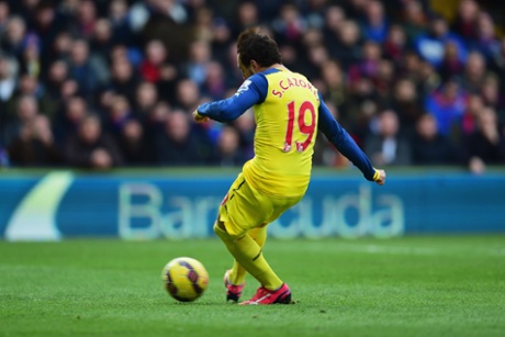 Santi Cazorla scores their first goal from the penalty spot.