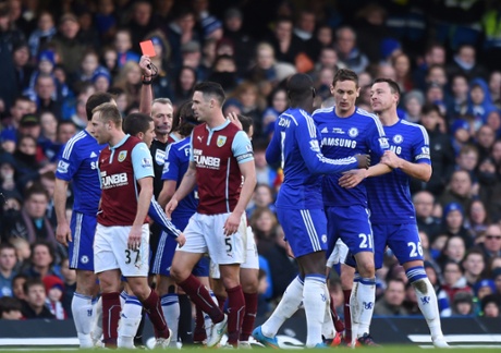 Nemanja Matic is shown a red card by referee Martin Atkinson.