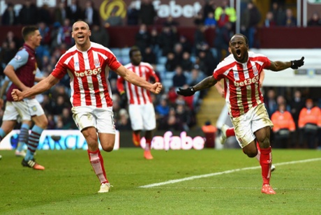 Victor Moses celebrates scoring their second goal with Jonathan Walters.