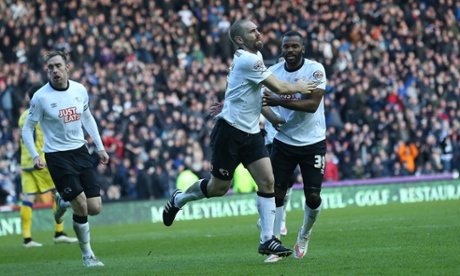 Jake Buxton and Darren Bent celebrate after the former's second equaliser against Sheffield Wednesday.