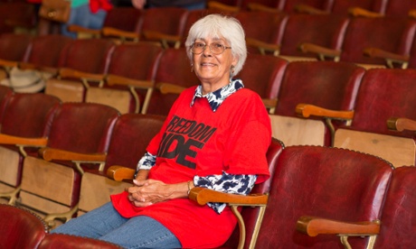 Ann Edwards seated in Bowraville theatre, which once segregated its audience by race.