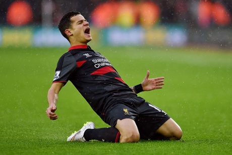 Philippe Coutinho celebrates.