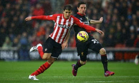 Filip Djuricic holds off the challenge from Joe Allen.