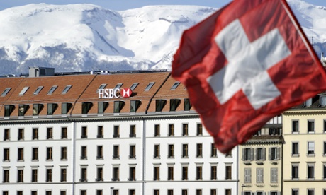 A Swiss flag flies above a HSBC logo.