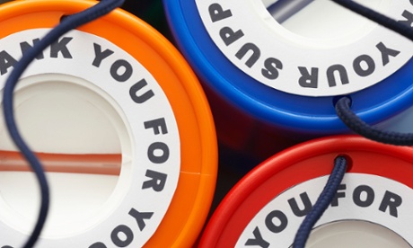 Collection of colourful charity tins.