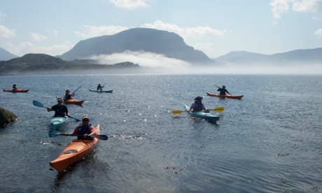 Sea kayaking on Loch Sheildaig in Scotland.