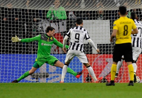 Alvaro Morata shoots and scores.