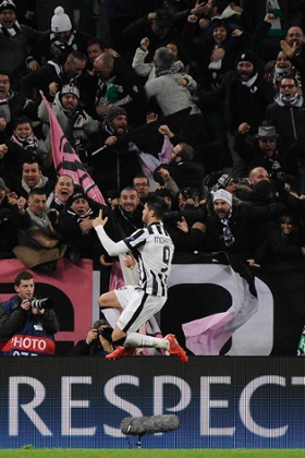 Alvaro Morata celebrates.