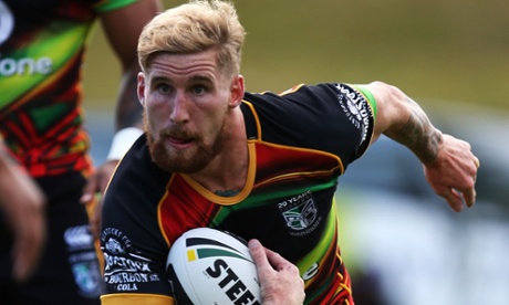 Sam Tomkins of the New Zealand Warriors runs with the ball during the NRL trial match against the Penrith Panthers this month.