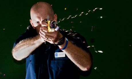 A Taser stun gun is demonstrated.