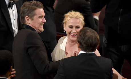 Ethan Hawke and Richard Linklater congratulate Patricia Arquette on her Oscar win.