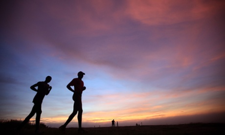Runners on a mountain in northern Uganda