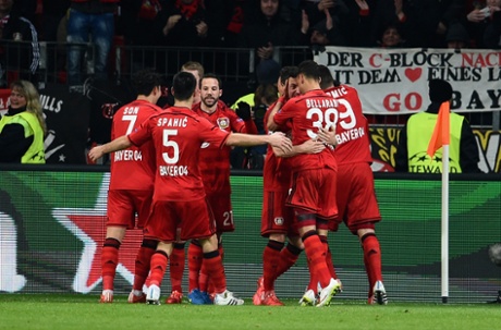 Hakan Calhanoglu celebrates scoring the opening goal with team mates.