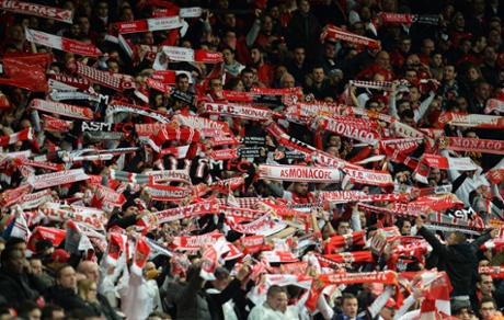 AS Monaco fans celebrate their team's 3-1 win.
