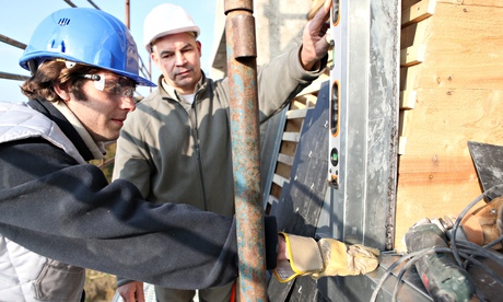 An apprentice on a building site