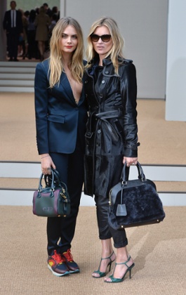 The popularity of mixing trainers with high fashion, as witnessed here by model Cara Delevingne at the Burberry spring/summer 2015 show, has helped drive the trend. (Photo by Anthony Harvey/GettyImages)