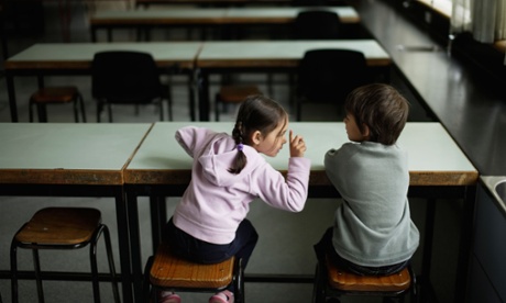 Two pupils in a classroom