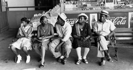 Local ‘laws’ meant that black people had to think twice before attempting to use any roadside service. Pictured: waiting for a street car in Oklahoma City, 1939.