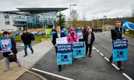Union members at the Met Office in Exeter stage their first ever pay strike in a staged walkout over pay.