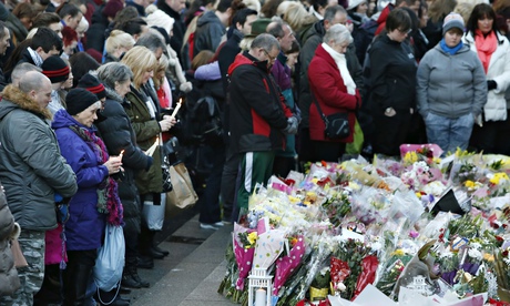 People attend a vigil near the Gallery of Modern Art in Glasgow, after a lorry killed six people.