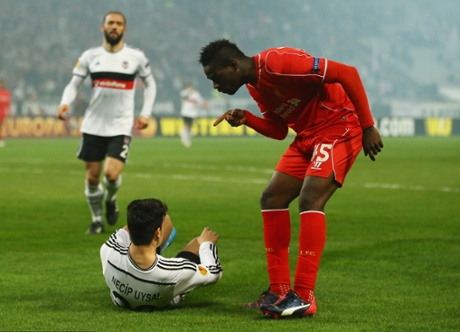 Mario Balotelli clashes with Necip Uysal of Besiktas after pushing him to the ground. He received a yellow card a few minutes later for another foul.