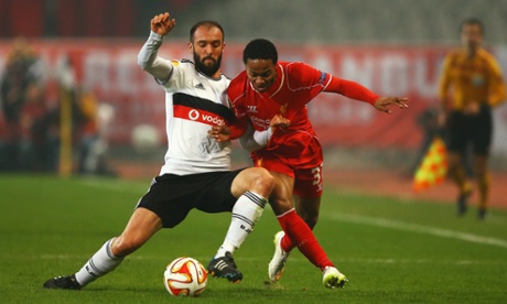 Raheem Sterling takes on Serdar Kurtulus of Besiktas as Liverpool begin to create chances.