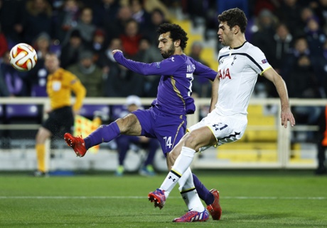 Mohamed Salah is challenged by Federico Fazio but looks dangerous against Tottenham.