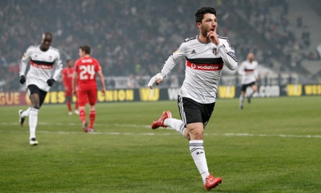 Besiktas' Tolgay Arslan celebrates after scoring the opener.