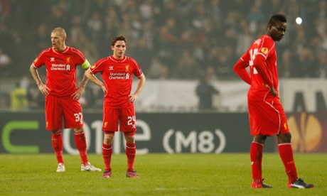 Joe Allen, Martin Skrtel and Mario Balotelli look dejected after Arslan's goal.