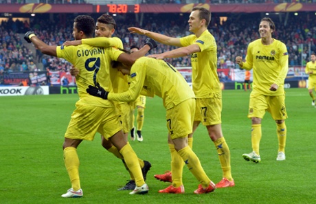 Villareal's players celebrate in Salzburg.