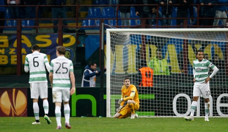 Celtic players dejected after Guarín’s late goal.