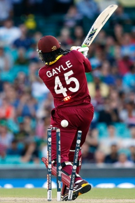Chris Gayle is bowled for three runs by South Africa's Kyle Abbott.