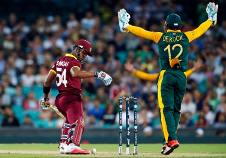 South Africa's wicketkeeper Quinton de Kock appeals successfully for LBW to dismiss Lendl Simmons for a duck.