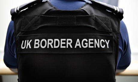 Immigration official prepares to visit a factory in Lancashire. Photograph: Gary Calton