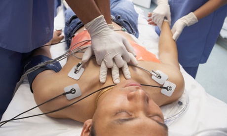 A patient receives CPR.