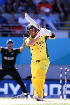 Aaron Finch loses his stumps earlier (Michael Bradley/AFP/Getty Images)