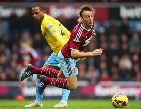 Jason Puncheon takes out Mark Noble.