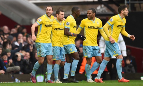 Glenn Murray celebrates with his teammates after scoring the third.