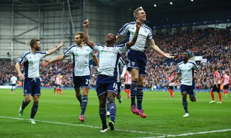 Saido Berahino celebrates with Darren Fletcher after scoring against Southampton.