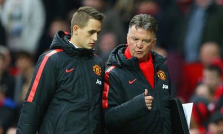 Louis van Gaal and Adnan Januzaj walk off at half-time.