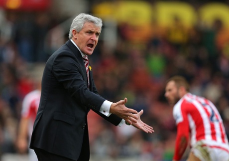 Mark Hughes shouts at the Britannia Stadium, still goalless there.