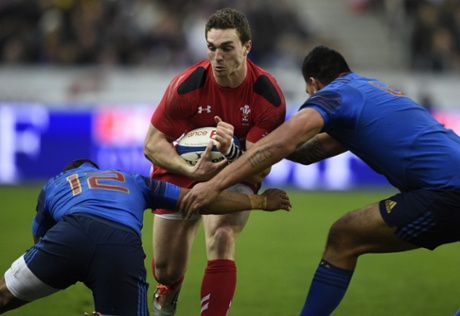 Wales' wing George North tries to break through the French defence.