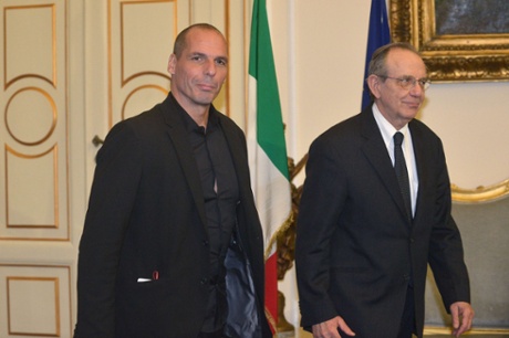 Greek Minister of Finance Yanis Varoufakis (L) arrives to meet his Italian counterpart Pier Carlo Padoan (R) on February 3, 2015 in Rome.