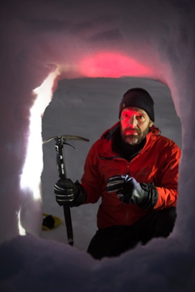 Tim inside the snowhole.