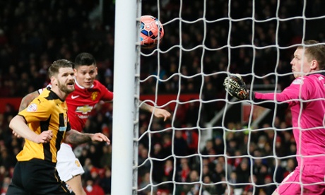 Marcos Rojo heads in United's second goal.