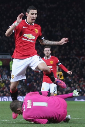 Angel di Maria in the thick of it for Manchester United.